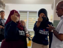 Who is Nurul Afiqah, the activist who stormed Law Minister K Shanmugam's MPS?